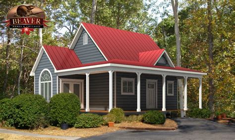 red farm house with black metal roof|red metal roof house ideas.